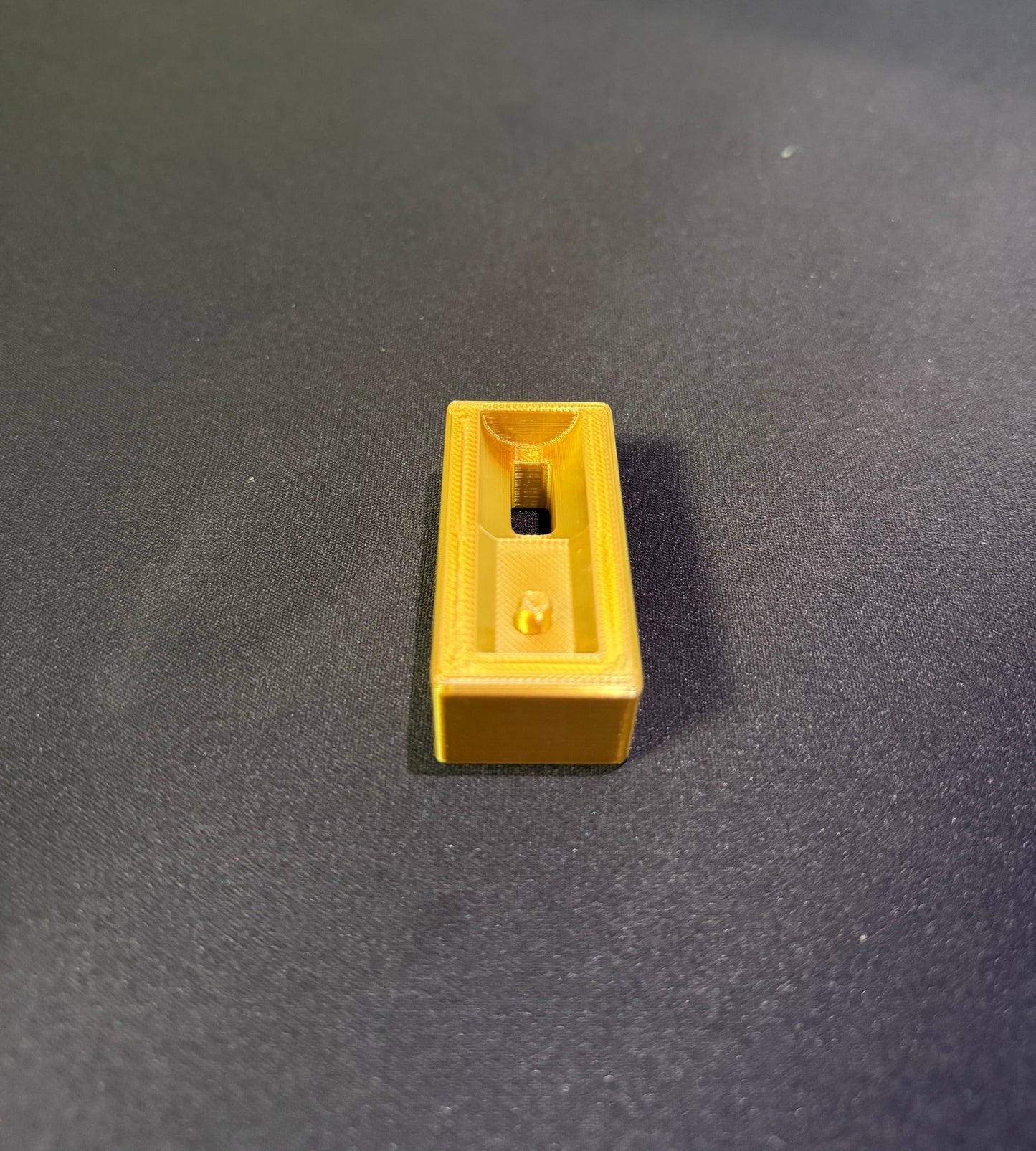 GOLDEN  PISTON HOLDER