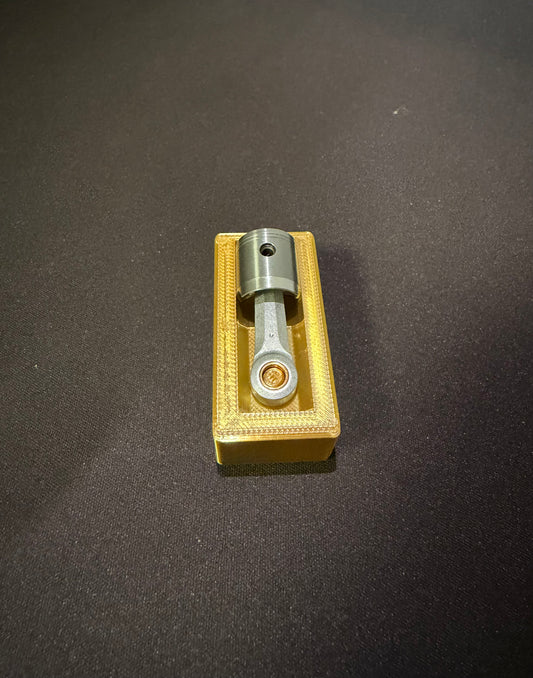 GOLDEN  PISTON HOLDER